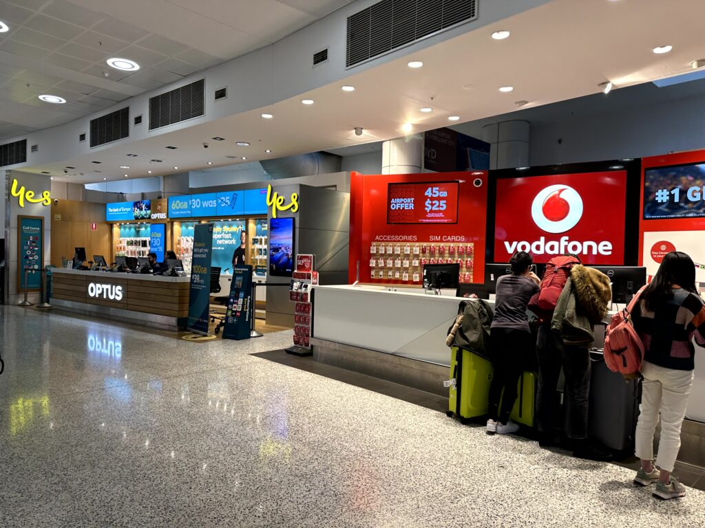 Sydney Airport Arrival Hall with Prepaid SIM Card from Optus and Vodafone (C) 2024 Foodnut